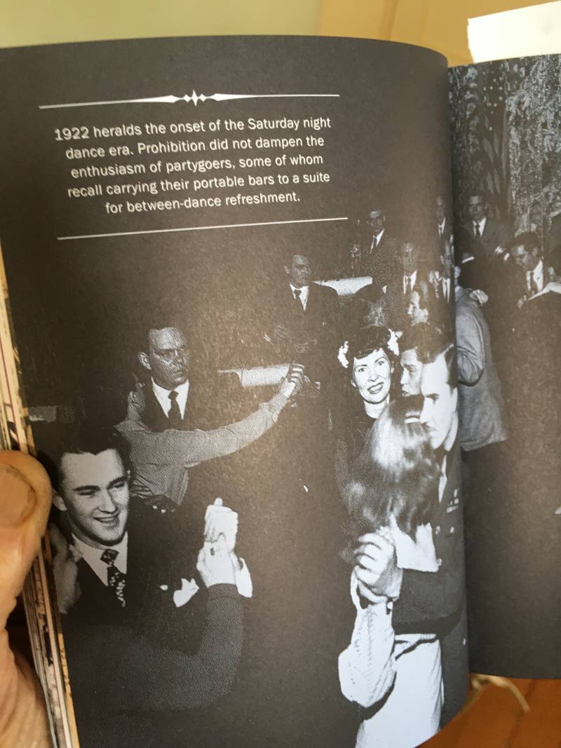Black and white image in a book of people dancing.