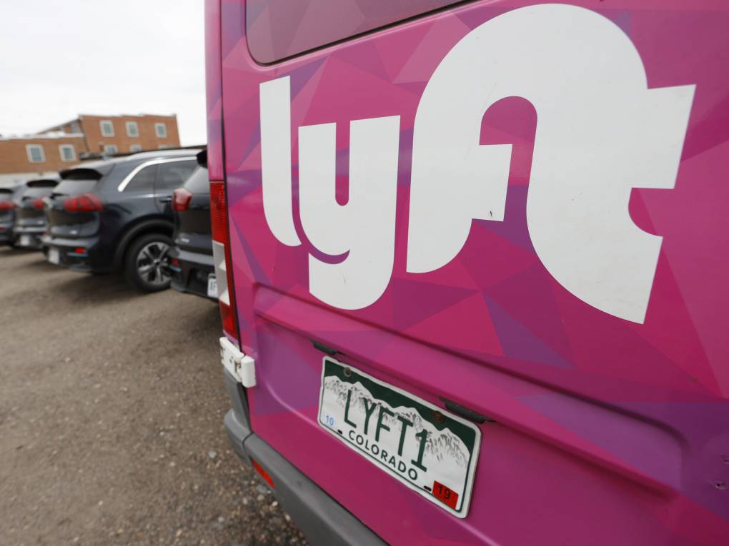 the back of a van that says 'Lyft'