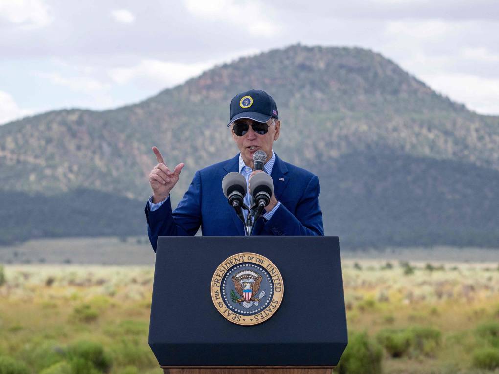 President Joe Biden stands at a lectern outside