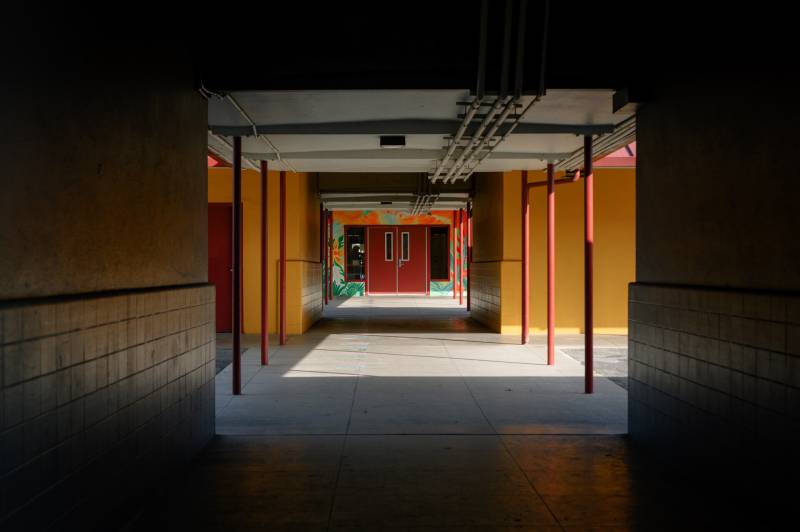A darkened walkway at Cesar Chavez Elementary School in East San José.