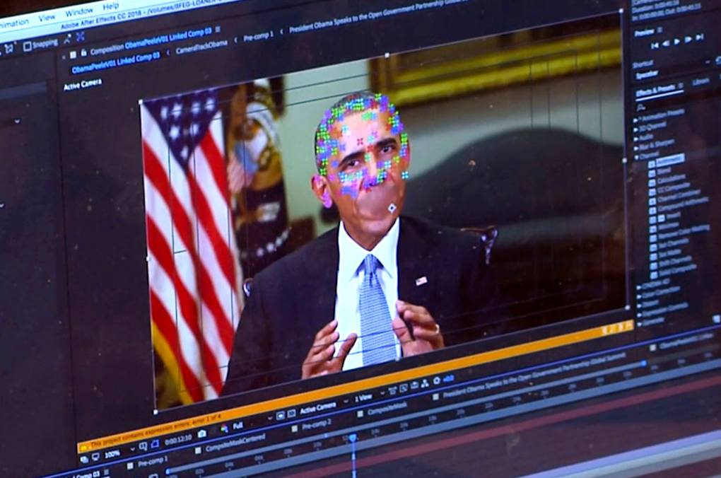 A video screencap showing Barack Obama with pixellated multi-colors on his face.