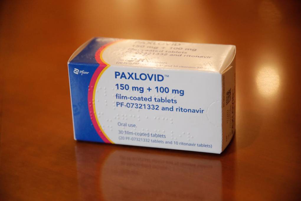 A white box with blue and red coloring on the left side that says "Paxlovid."