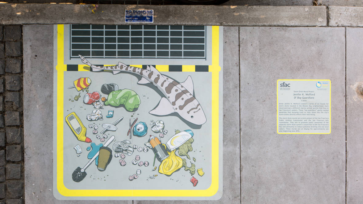 A shark patrols a Mission Bay stormdrain in one of Jenifer Wofford's 'SF Bay Guardians' murals. © Ethan Kaplan
