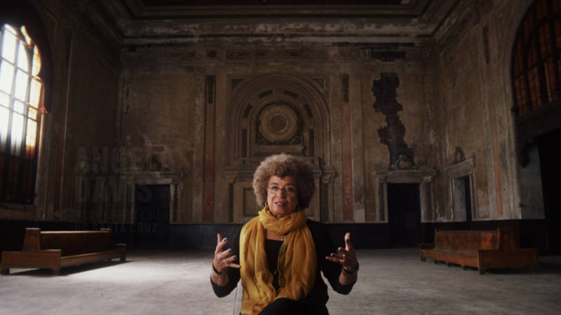Angela Davis speaks inside West Oakland's abandoned 16th Street train station, in a still from Ava DuVernay's '13th.'