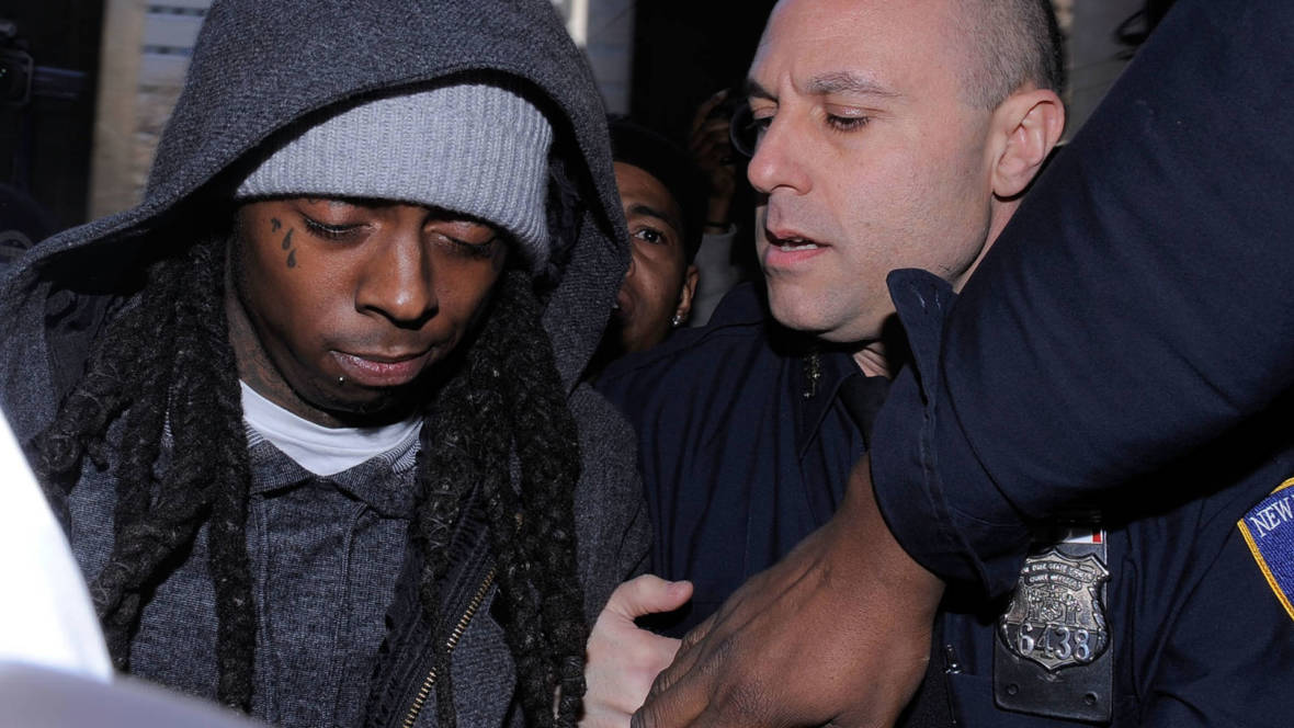 Lil Wayne arrives at New York State Supreme Court to begin serving a 1 year prison sentence for possession of an illegal weapon on March 8, 2010, in New York City.   Jemal Countess/Getty Images