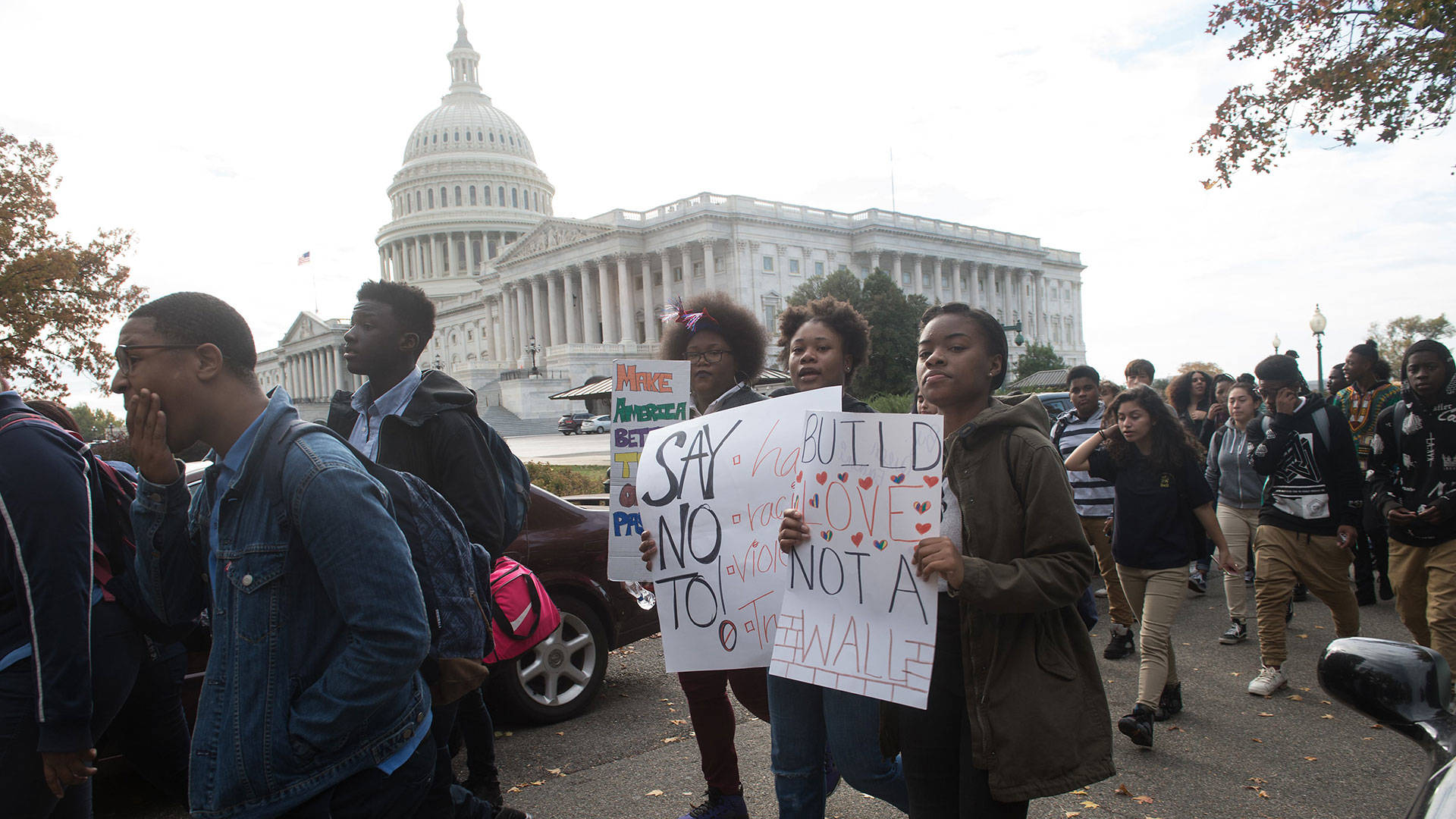 Secondary school students holds signs in front of the US Capitol in Washington, DC, on November 15, 2016 as they protest the election of US President-elect Donald Trump. Photo: Nicholas Kamm/AFP/Getty Images