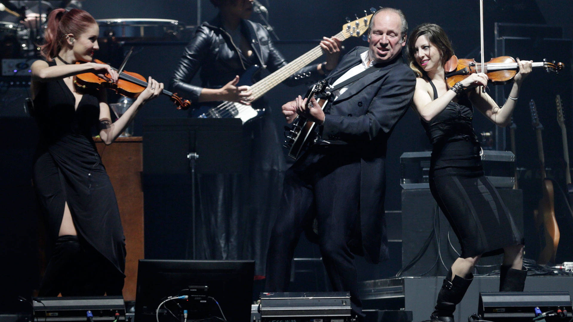 Hans Zimmer, on banjo, performs with members of his band at the Bill Graham Civic Auditorium in San Francisco on April 19, 2017. Photo: Gabe Meline/KQED
