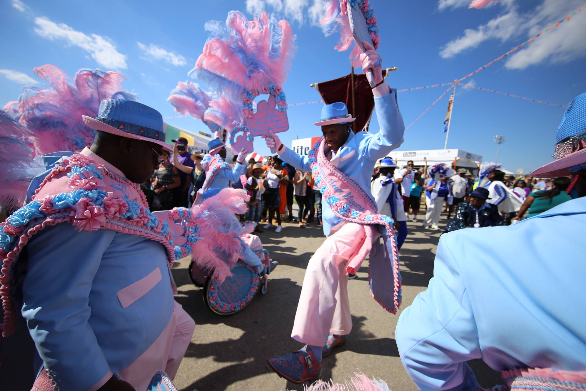 A second-line parade at the 2017 New Orleans Jazz and Heritage Festival, one of many sights underlining the event's place-based identity. Photo: New Orleans Jazz and Heritage Festival