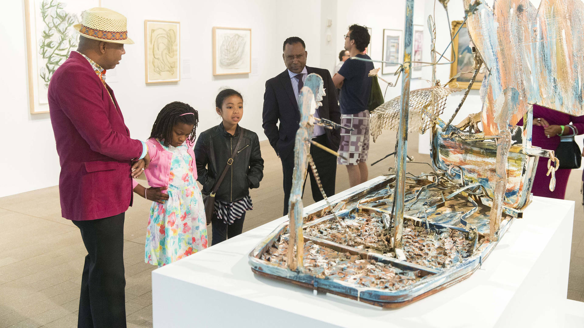 Guests viewing work by Thornton Dial, Jr., 'The Slave Ship,' 1988 in 'Revelations: Art from the African American South' at the de Young. Photo by Drew Altizer Photography; Courtesy of the Fine Arts Museums of San Francisco