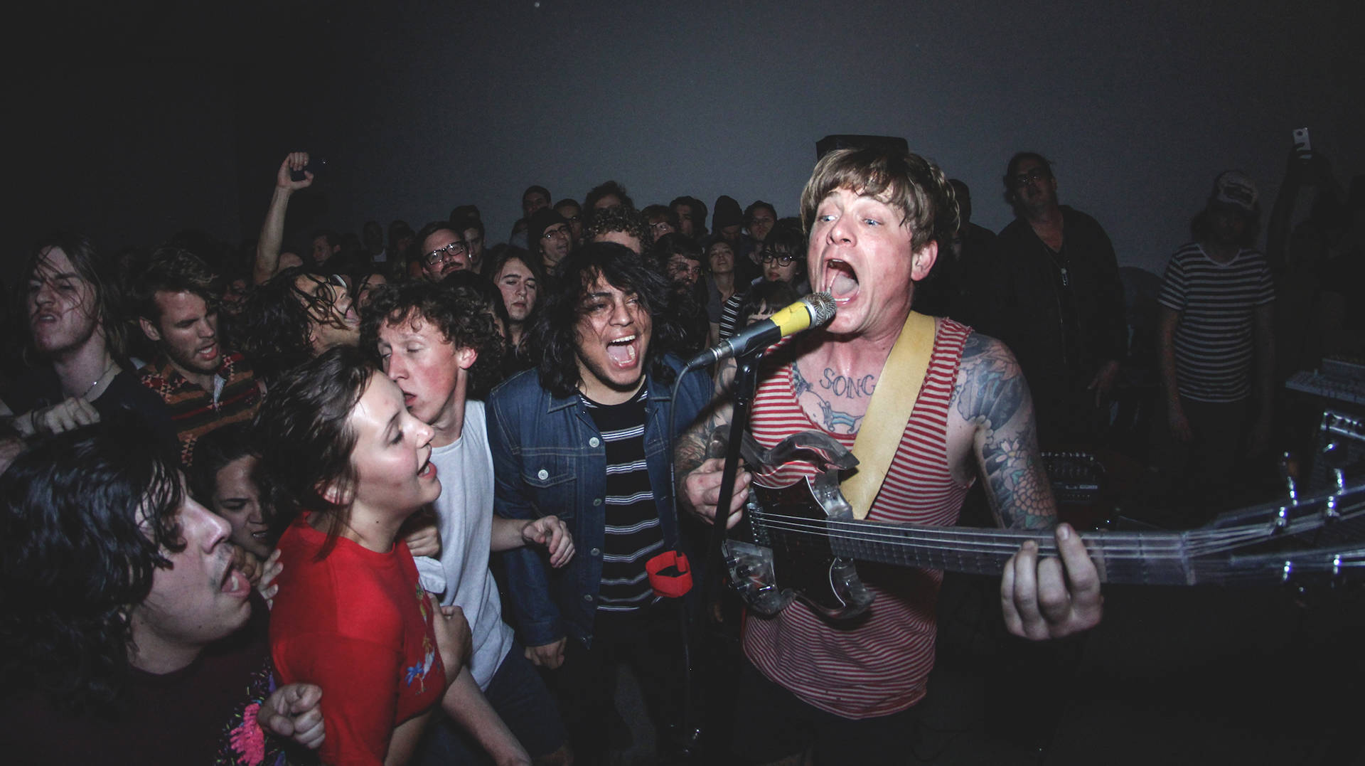 John Dwyer singing with his band Thee Oh Sees Mini Van Photography