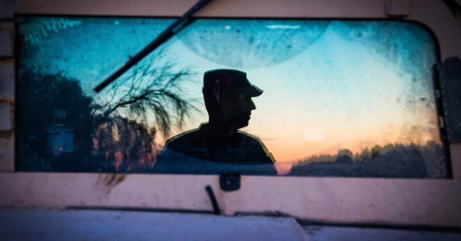 A soldier from the 36th Infantry Division, Texas Army National Guard observes a section of the Rio Grande River at sunset in support of Operation Strong Safety.  U.S. Army photo by Maj. Randall Stillinger. Wikimedia Commons