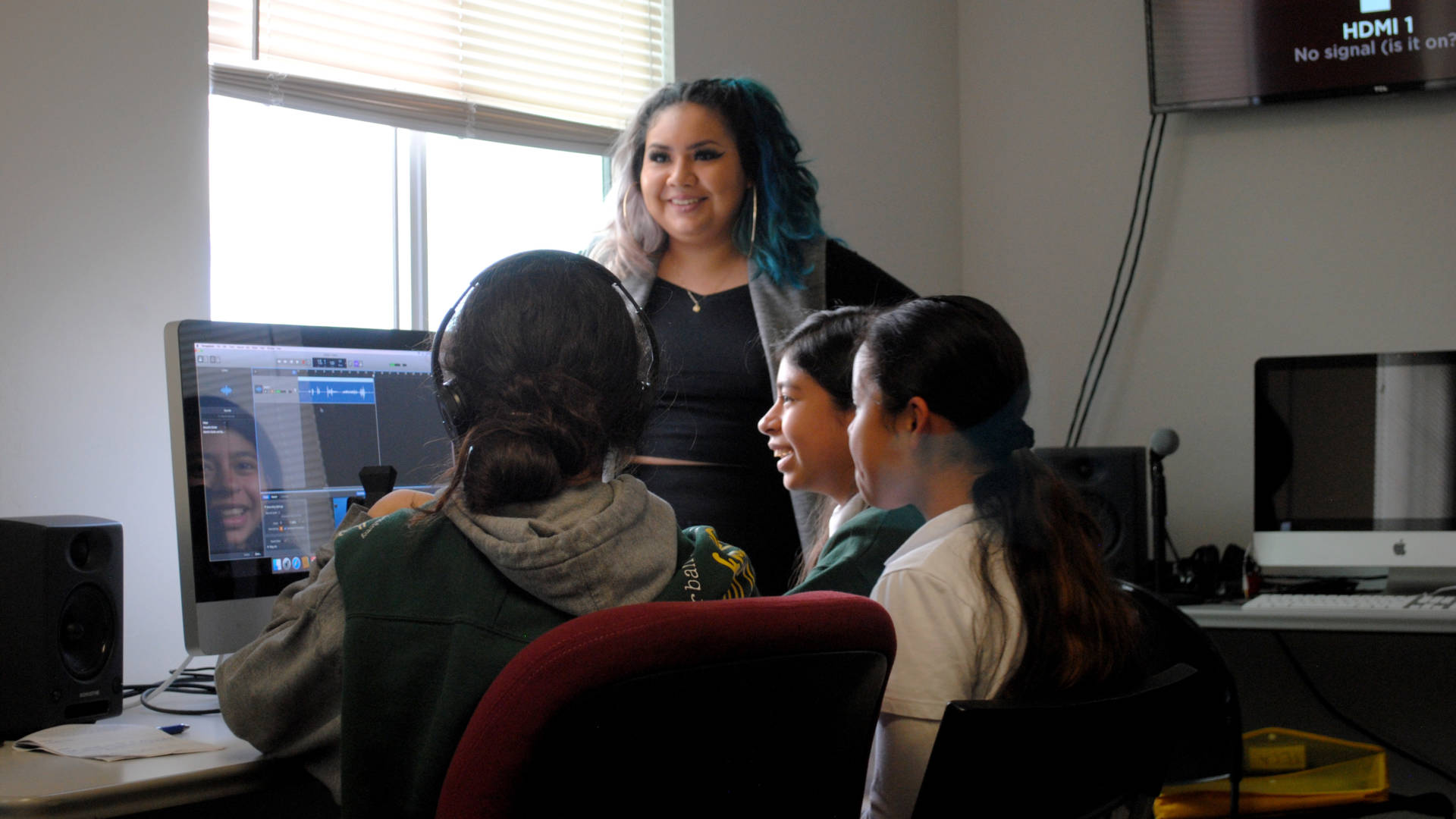 Women's Audio Mission instructor Victoria Farjado leads a Girls on the Mic class at WAM's Oakland location.