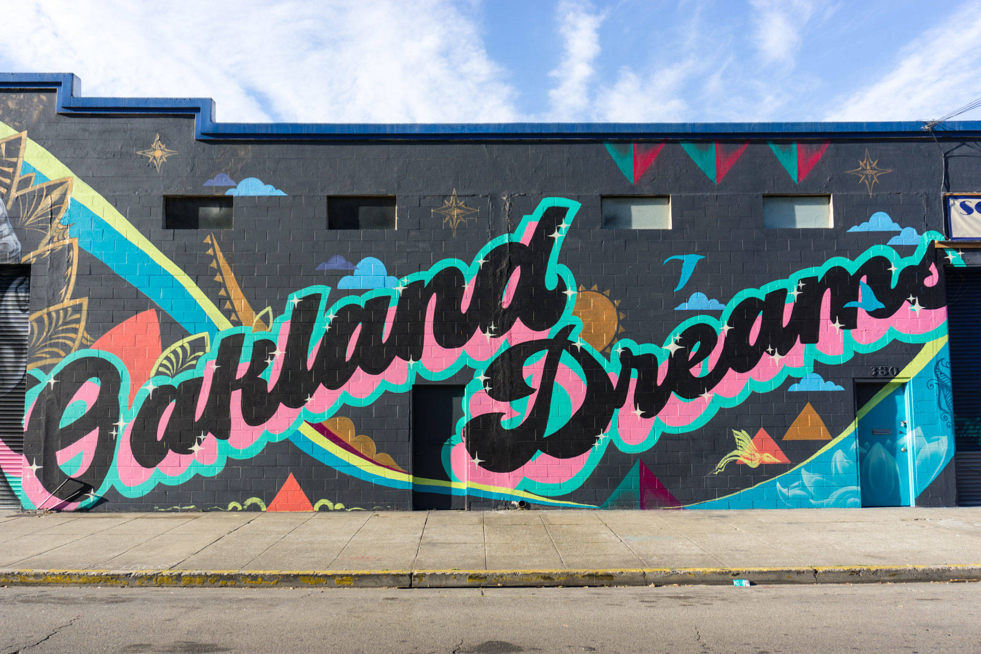 Oakland Dreams mural by Trust Your Struggle Collective as part of Oakland Mural Festival 2018. Lina Blanco / KQED