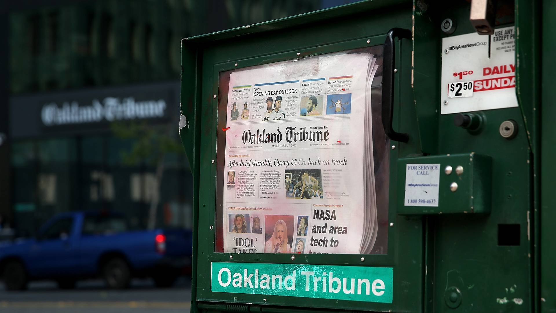 The final edition of the Oakland Tribune is displayed in a newspaper rack in front of the Oakland Tribune offices on April 4, 2016. Justin Sullivan/Getty Images