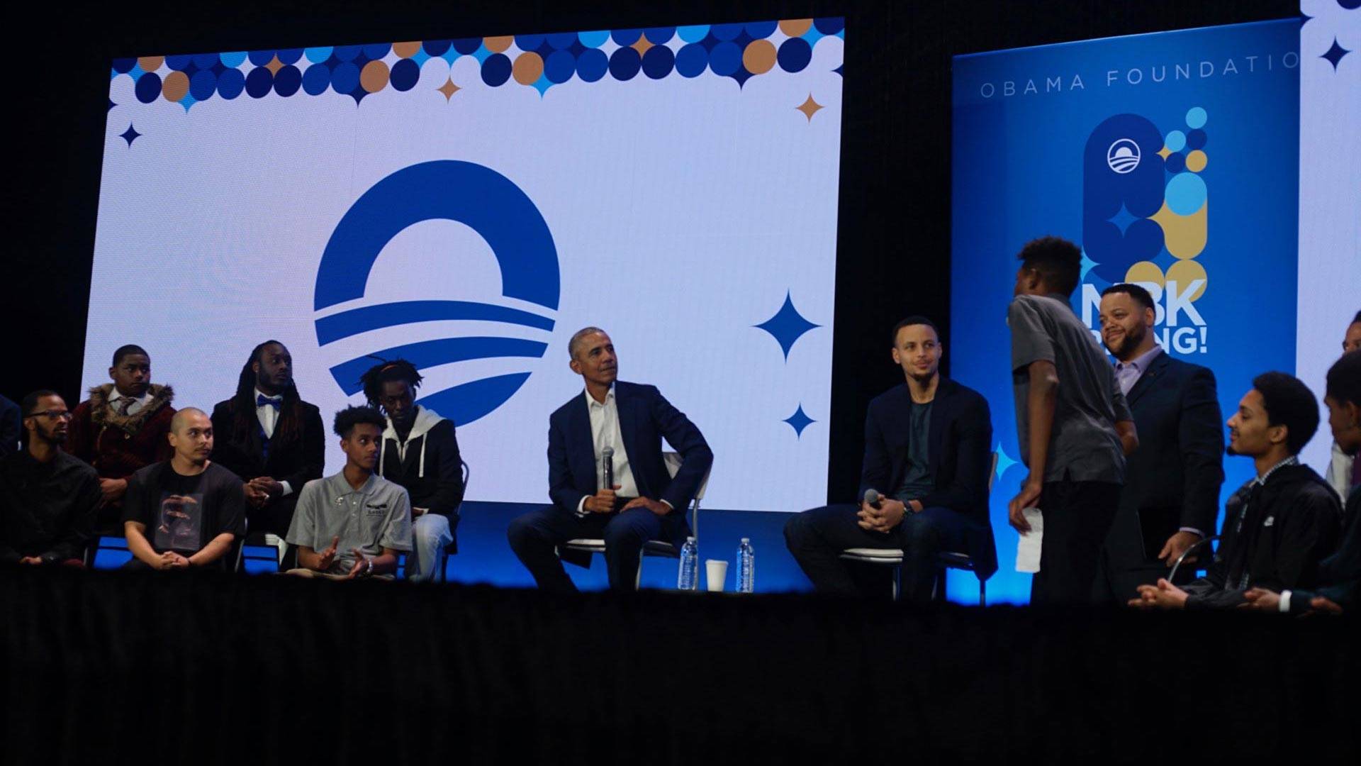 Former president Barack Obama and the Warriors' Stephen Curry at the My Brither's Keeper conference in Oakland, Feb. 19, 2019. Pendarvis Harshaw/KQED