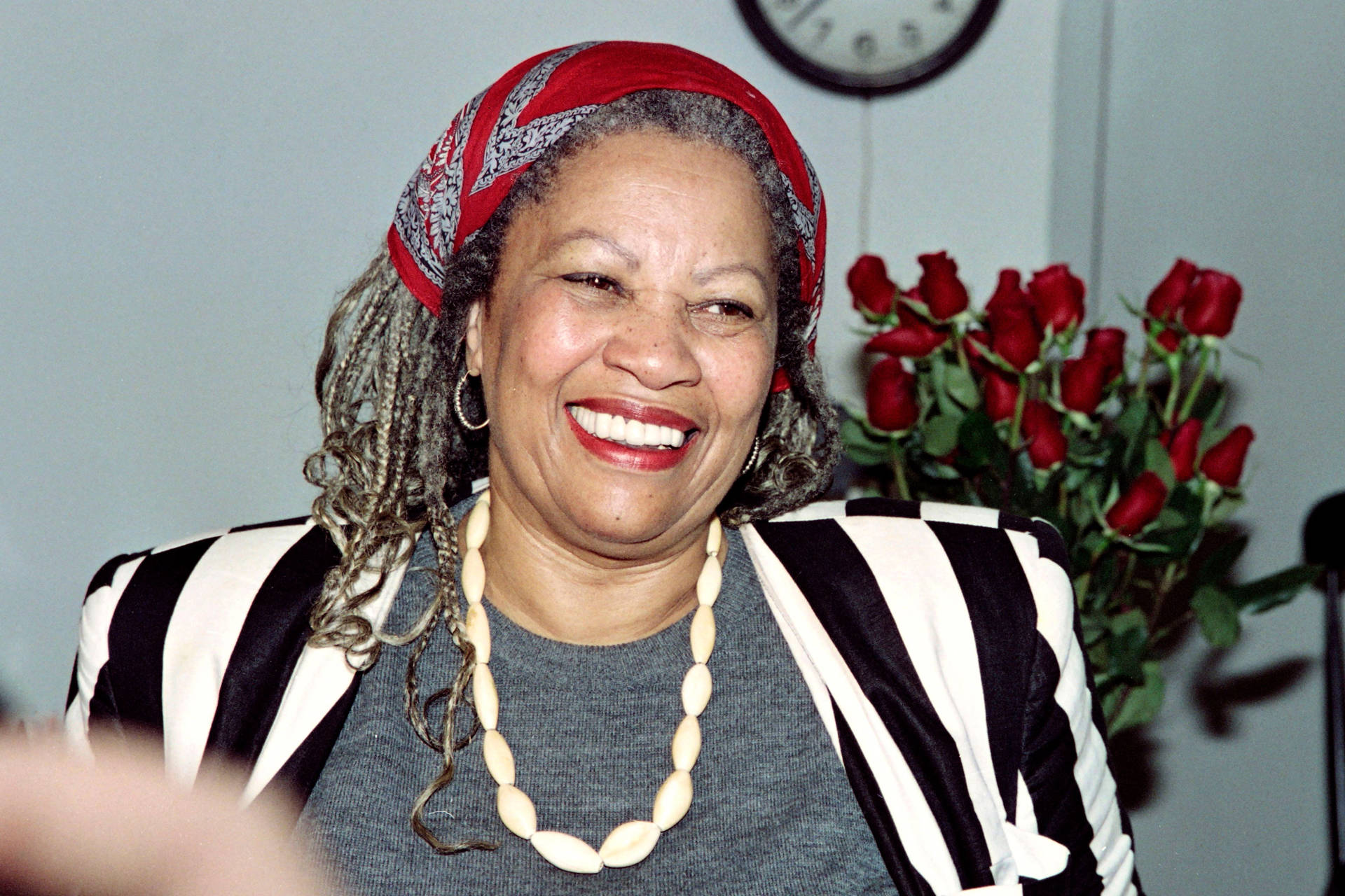 U.S. author Toni Morrison smiles in her office at Princeton University in New Jersey, while being interviewed by reporters on October 7, 1993. - Morrison said "I am outrageously happy" after hearing that she had won the Nobel Prize for Literature. DON EMMERT/AFP/Getty Images