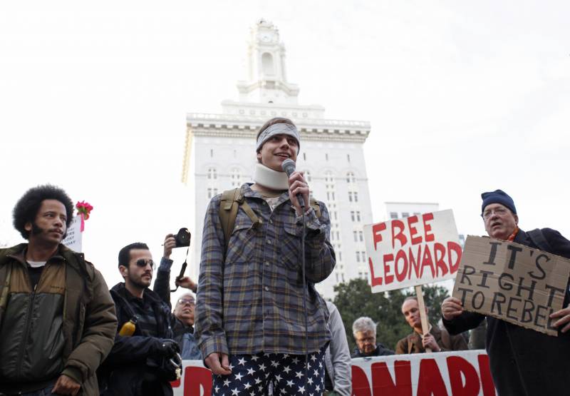 Scott Olsen, a war veteran, who was injured by a police projectile during a Occupy Oakland protest on Oct. 25, speaks in front of Occupy Oakland protesters near Oakland City Hall during the West Coast port blockage on Dec. 12, 2011 in California.