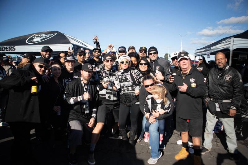 Raiders fans tailgate for the final Raiders home game at the Oakland Coliseum.