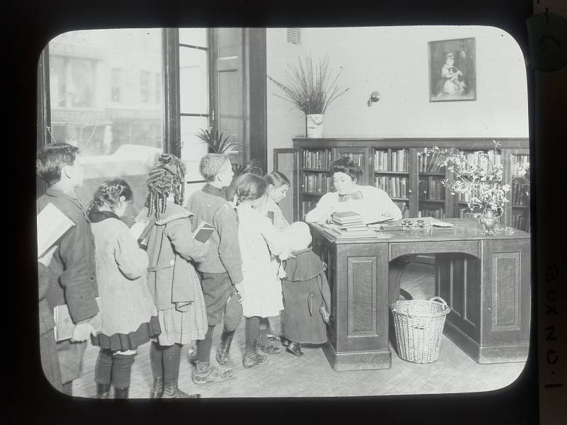 Children line up at the Chatham Square Library on Manhattan's Lower East Side in 1911.