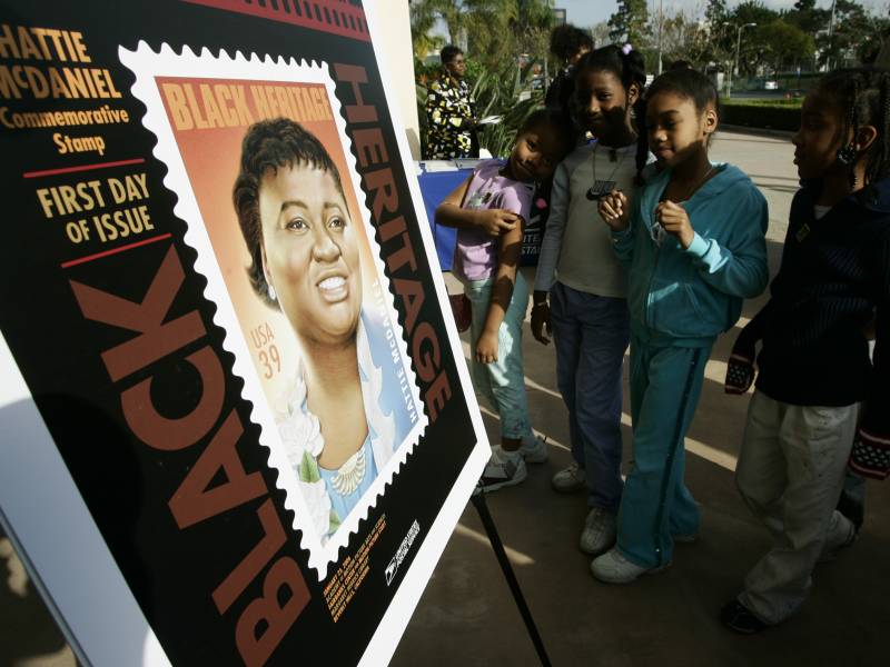 Los Angeles school children attend a ceremony unveiling a commemorative U.S. Postal Service stamp for actor Hattie McDaniel in 2006, in Beverly Hills, Calif. McDaniel, also a singer, radio and television personality, was the first African American to win an Oscar, for her portrayal of Mammy in 'Gone With the Wind.'