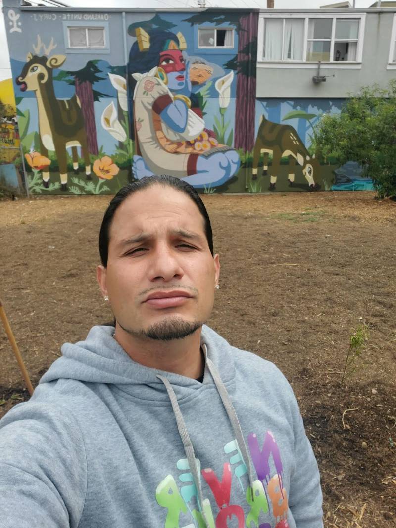 Michael Muscadine in the community garden, in East Oakland's Fruitvale neighborhood.