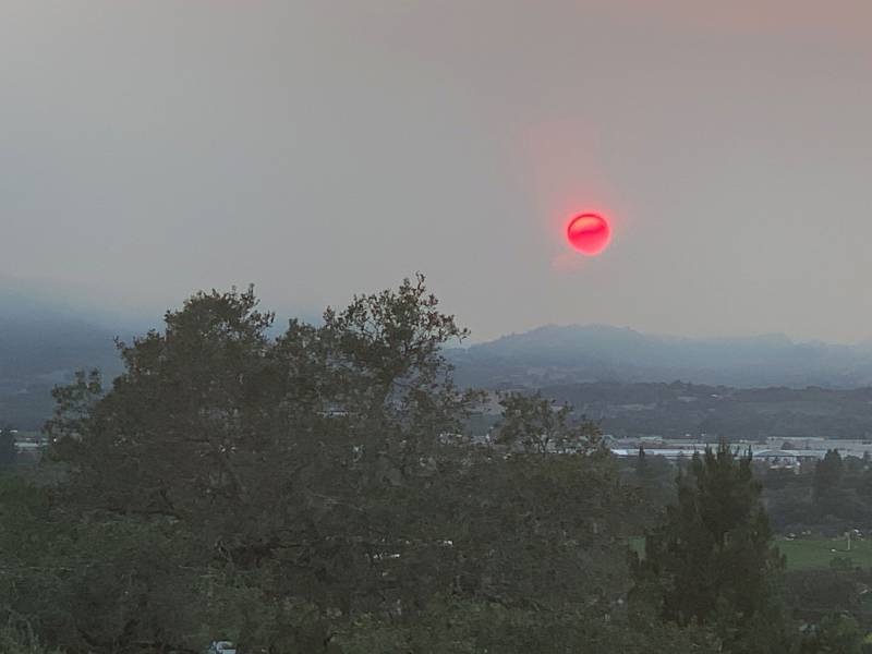 The sun turns crimson red in Sonoma County due to smoke from the LNU Lightning Complex fires.
