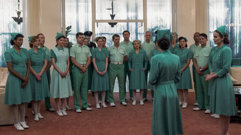 The staff assembles in front of Nurse Bucket (Judy Davis) in 'Ratched.'