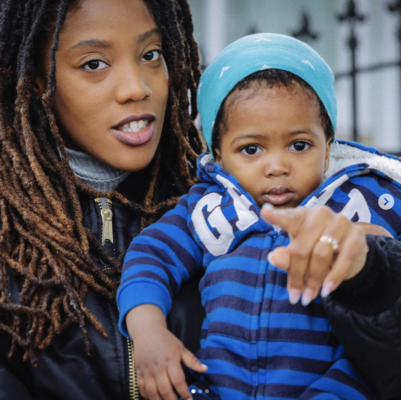 Poet and educator Jazz Hudson holds her young son, Selah.