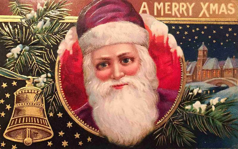 A Victorian Christmas card depicts Santa with large, mesmerizing eyes and fluffy white beard.