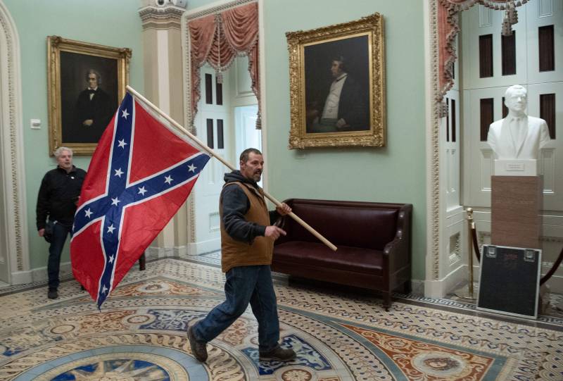 A confederate flag-waver inside the US Capitol Rotunda on Jan. 6, 2021.