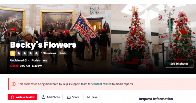 The Becky's Flowers Yelp page is currently dominated by a photo that appears to show owner, Jenny Cudd, inside the Capitol Building, draped in a Trump flag.