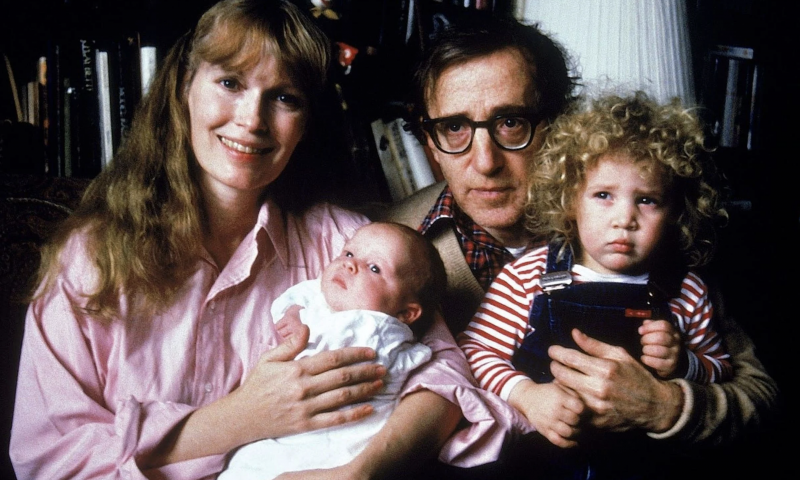 Mia Farrow and Woody Allen at home with newborn Ronan (née Satchel) Farrow, and their adopted daughter, Dylan.