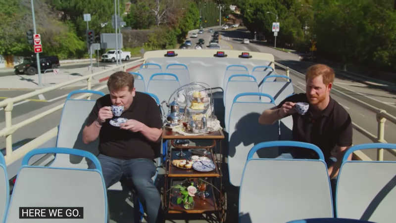 James Corden and Prince Harry enjoy afternoon tea on an open-top bus in Los Angeles.