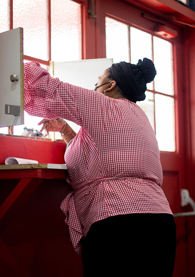 Crystal Martin stands inside her Alameda commercial kitchen space during one of her Flint's pop-ups.