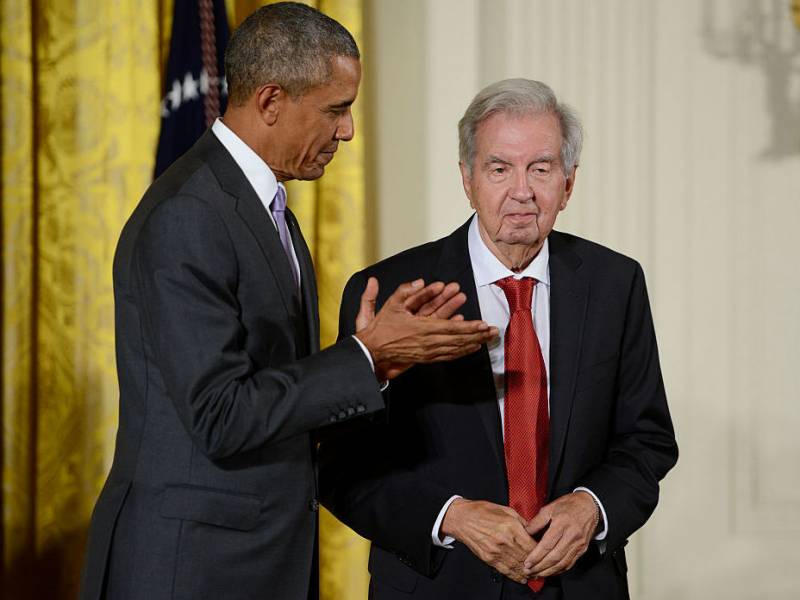President Barack Obama presents novelist, essayist and screenwriter Larry McMurtry with the 2014 National Humanities Medal at The White House on September 10, 2015 in Washington, DC.