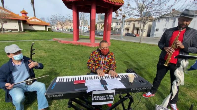 Tao Shi, Kev Choice and Howard Wiley (L–R) perform in Chinese Garden Park in Oakland. Adding an ehru to his jazz ensemble was "a powerful example of solidarity," says Choice.