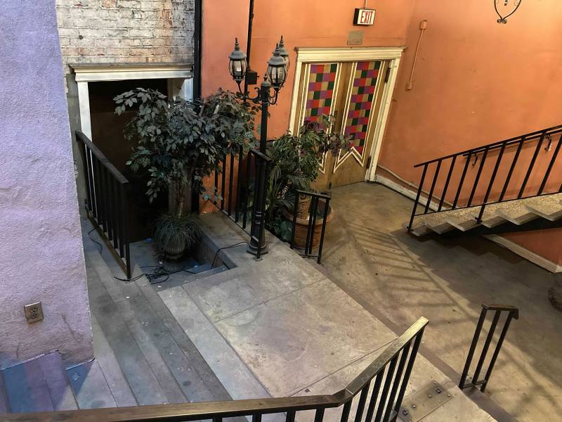 Plants on the ground floor, put in place by Anne Bishop, after a Feng Shui expert advised her that something bad had happened in the area. Drew Washer saw an apparition heading to the area early one morning as she set up her shop.