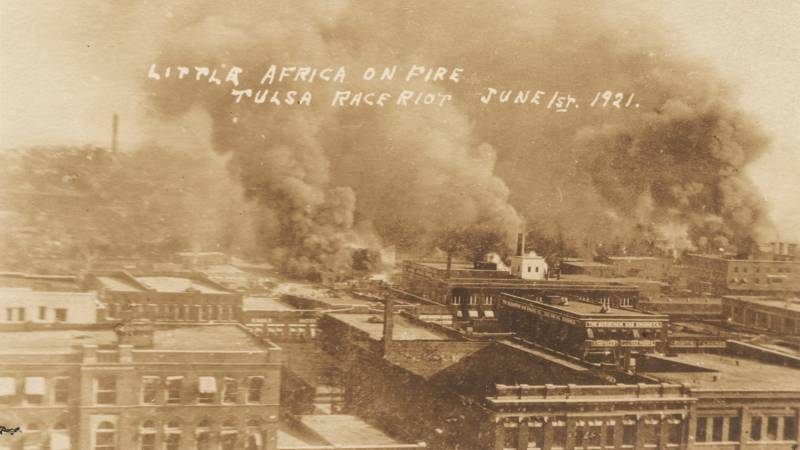 Graphic photos of the Tulsa Race Massacre were turned into postcards and distributed by some white people. This one is labeled: "Little Africa on Fire, Tulsa Race Riot, June 1, 1921."