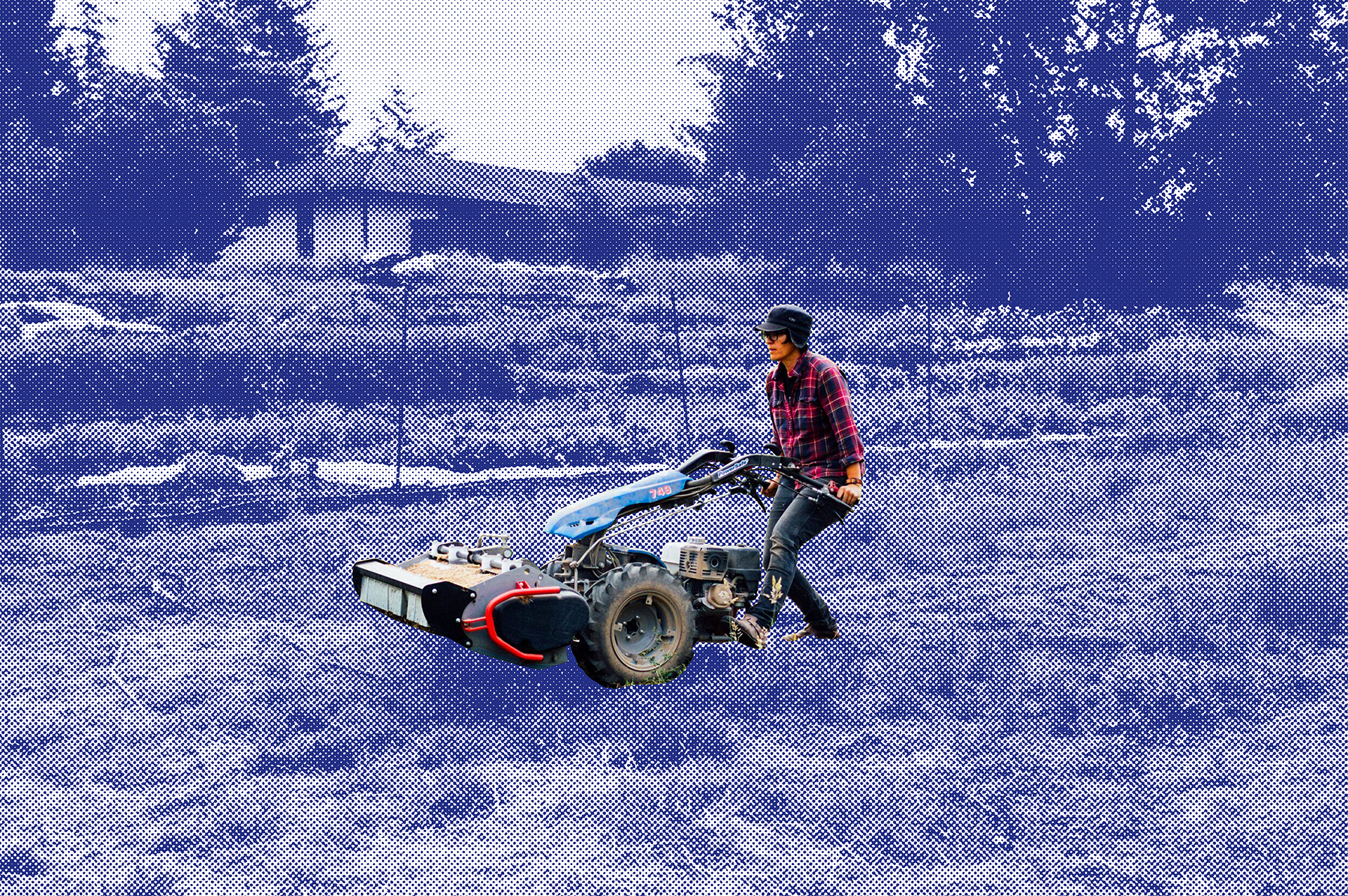 Leslie Wiser pushes a plow in a field; the backdrop of the field is shaded blue.
