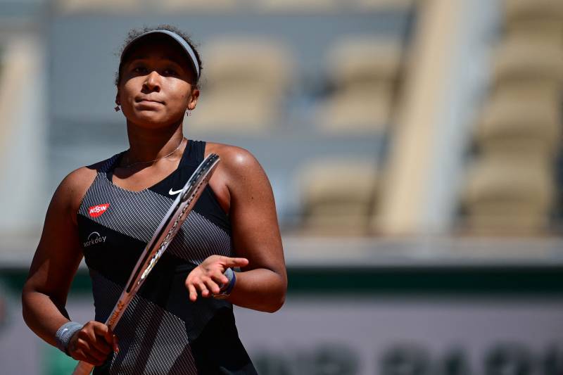 Japan's Naomi Osaka celebrates after winning on Day 1 of the Roland Garros 2021 French Open tennis tournament in Paris. May 30, 2021.