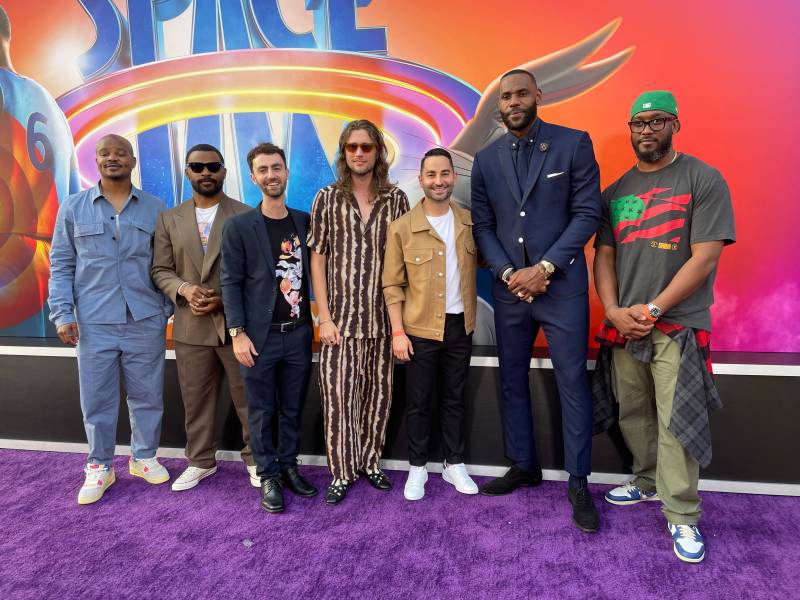 Actors, rappers and producers pose for a photo on the red carpet at the premiere of 'Space Jam: A New Legacy.'