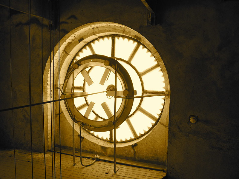 View from inside the tower out thorough the backlit clock face.