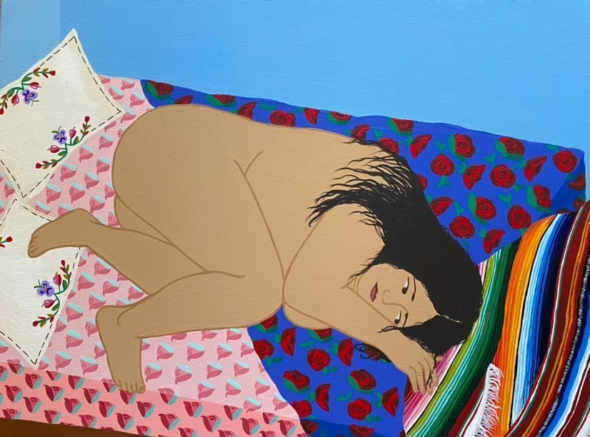 A naked woman is lying in a fetal position on a bed.
