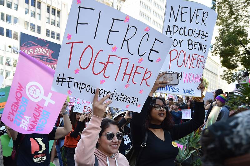 Protestors march to City Hall during the Third Annual Women's March in downtown LA, January 2019.