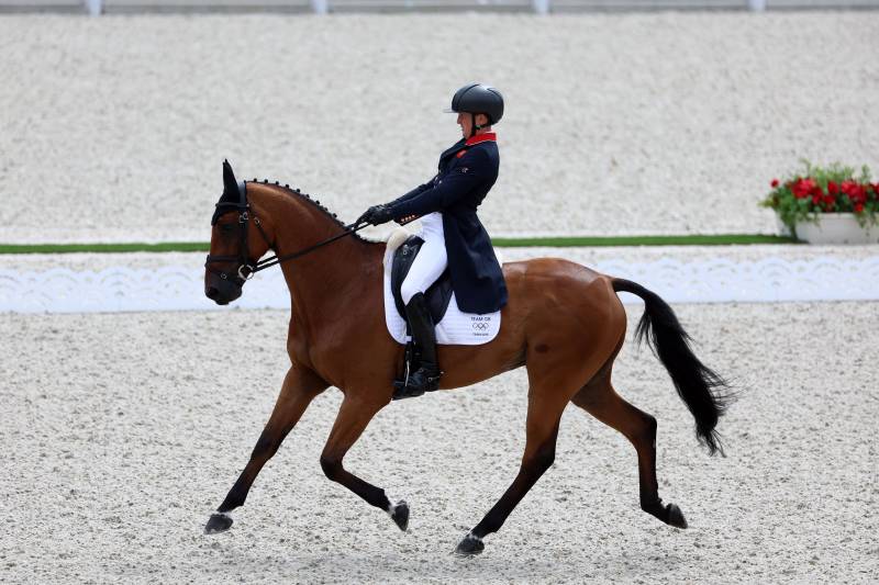 Britain's Tom McEwen riding Toledo de Kerser in the individual dressage competition at the Tokyo Olympics, July 31, 2021.