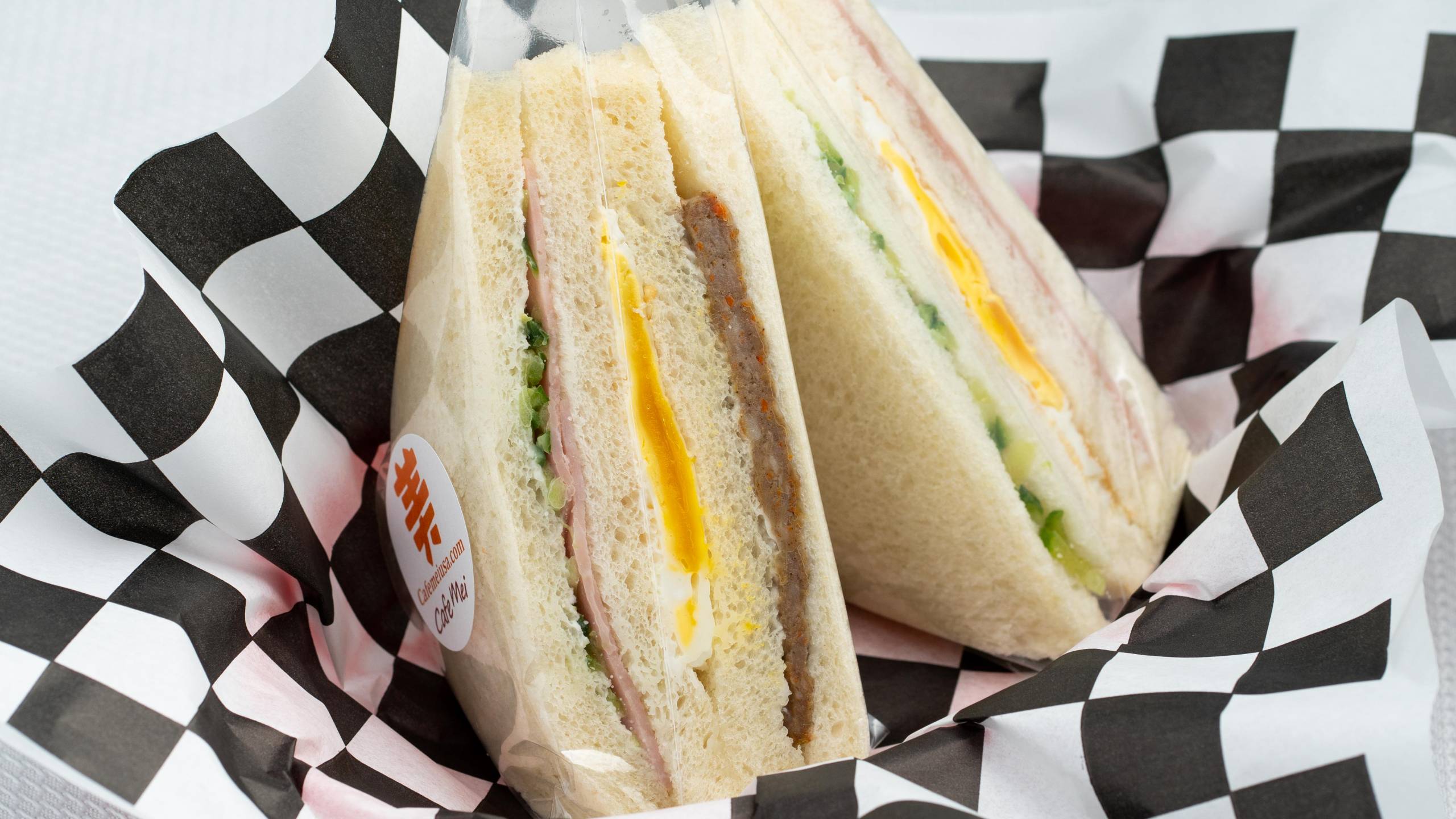 A Taiwanese breakfast sandwich wrapped in plastic.