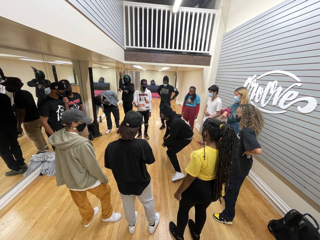 Dancers gathered in a circle during an open lab at In The Groove Studios in Oakland.