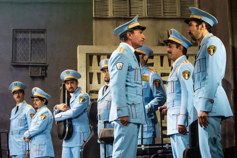 The cast of 'The Band's Visit' in powder blue military band uniforms.