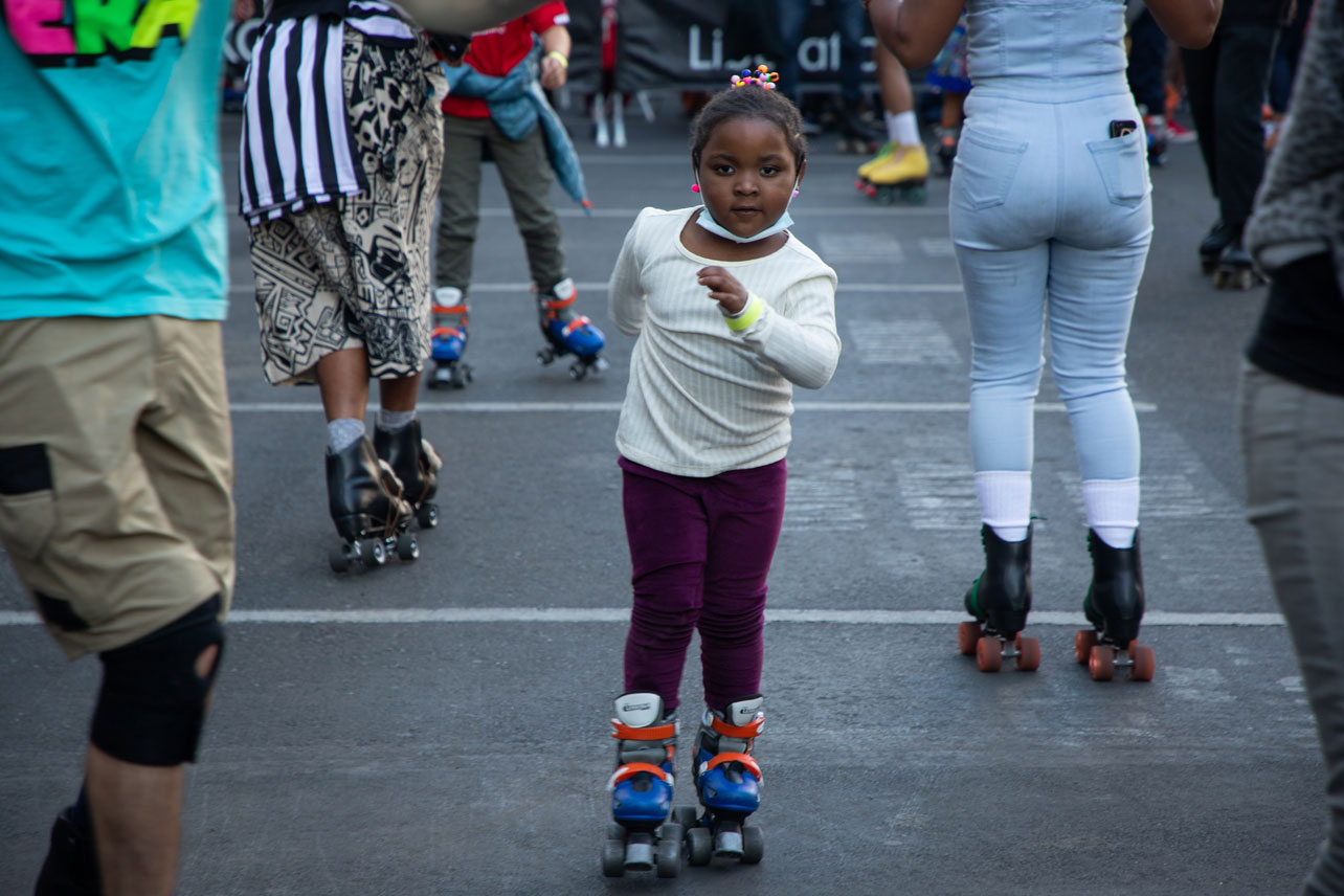 A young person roller skates