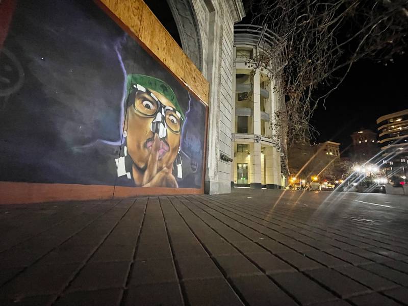 A mural of the late Shock G (aka Humpty Hump) located at Frank Ogawa Plaza, painted by Kufue. 